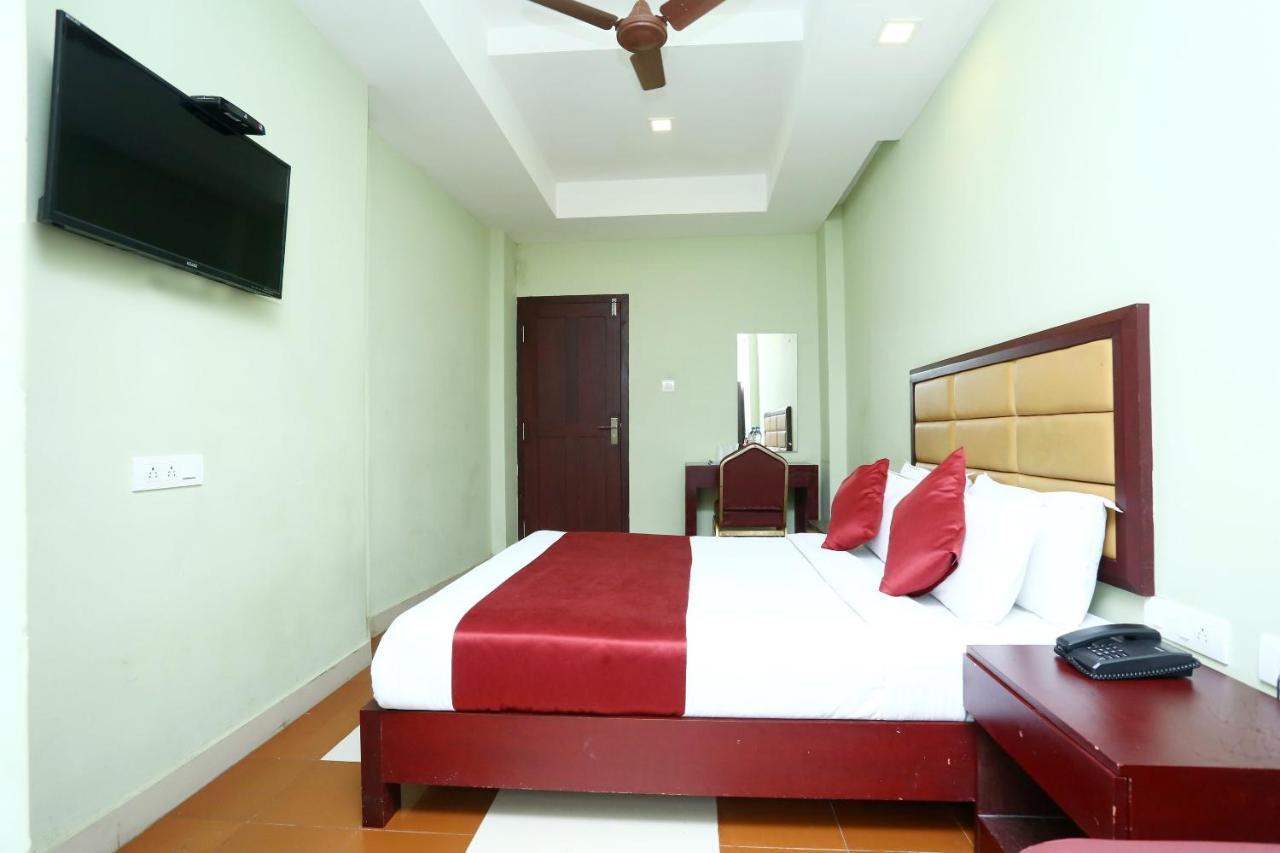 Oyo 15190 Select Residency Hotel Kozhikode Bagian luar foto